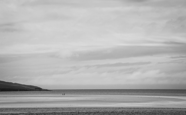 Two islanders take a walk on an empty stretch of Luskentyre beach on the Isle of Harris and make a minimalist photographer very happy. 